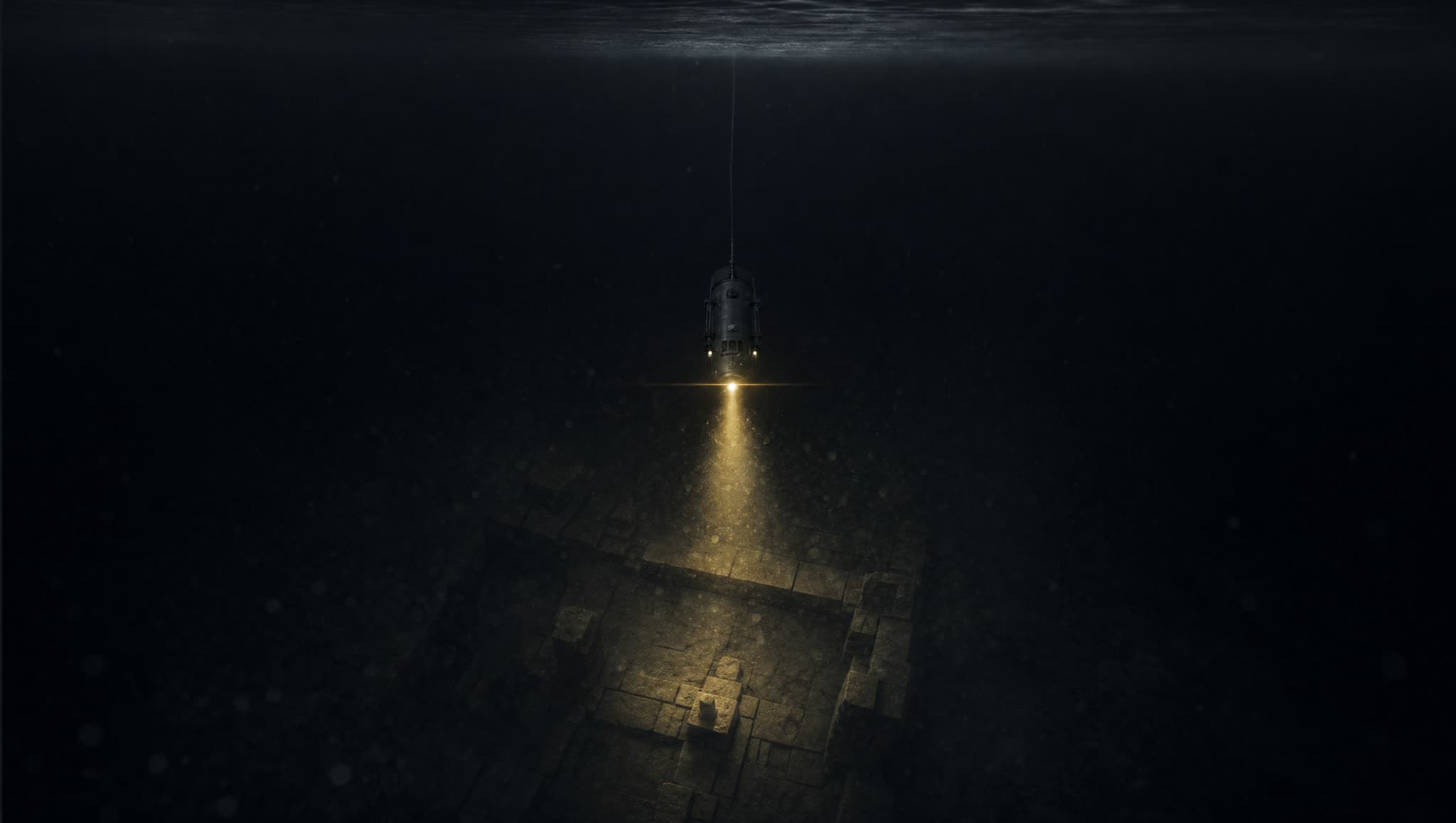 Un ROV desciende por su cable e ilumina con haz dorado piedra cortada prehispánica sumergida en agua negra